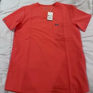 FIGS Limited Edition Men’s Chisec Scrub Top in Coral Pink